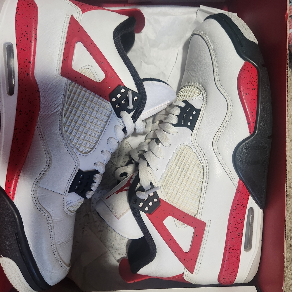 Jordan Air 4 Retro in White, Fire Red, and Black